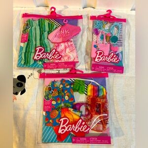 Barbie and Ken clothes and accessories new.